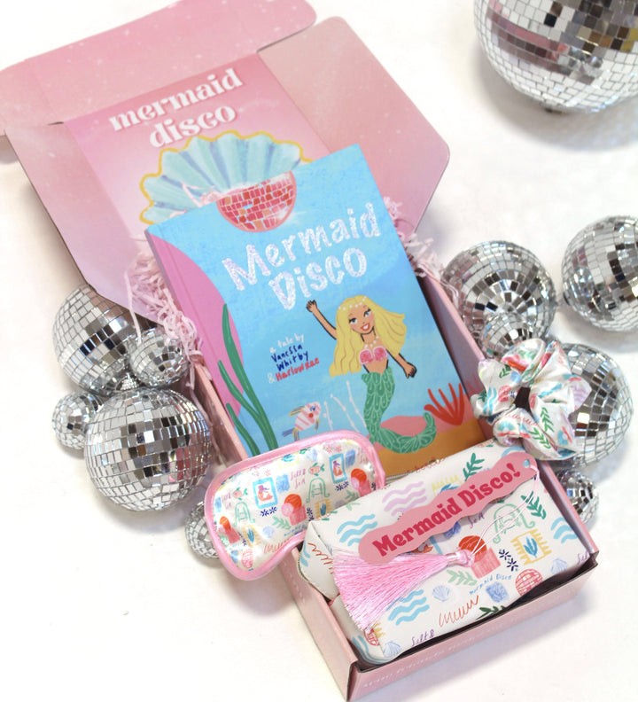 Mermaid-themed disco ball set with packaging on a white background