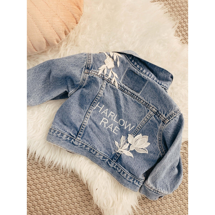 Custom jean jacket with embroidered Harlow Rae written on it